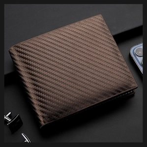 Macro detail of dark brown carbon fiber wallet with twill texture and precision stitching