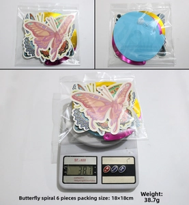 Detailed view of 6-pack colorful butterfly hanging swirls with packaging size and weight measurement
