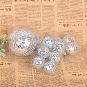 Two packs of silver mirror disco ball cake toppers in large and small sizes for DIY decor