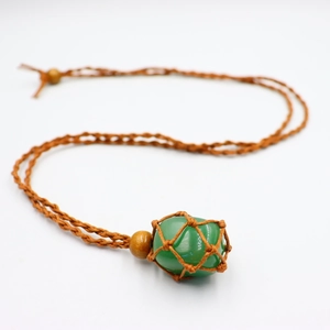 Handmade woven necklace featuring a natural green raw stone pendant and adjustable brown cord