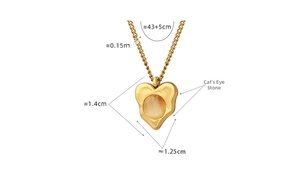 Detailed view of heart cat's eye pendant with measurements 1.4cm by 1.25cm on a gold chain