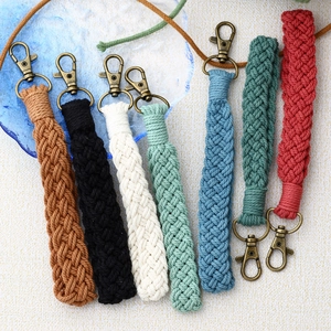 Handmade bohemian braided wrist strap keychains in seven vibrant colors with bronze clasps