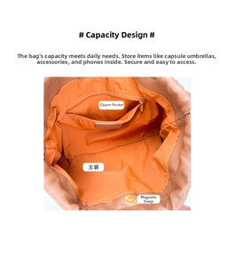Detail view of leather bag interior showing spacious main compartment and zipper pocket