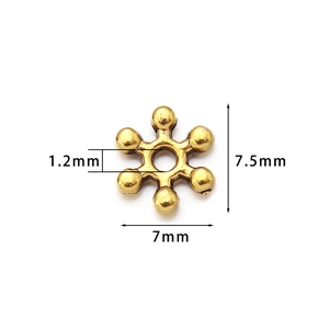 Golden 7mm snowflake spacer bead for DIY jewelry making with detailed size measurements