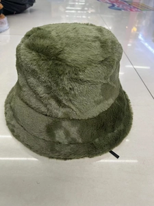 Detailed top view of olive green faux fur bucket hat showing thick plush texture and soft brim