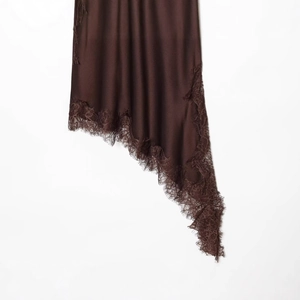 Elegant dark brown satin dress featuring delicate eyelash lace trim and asymmetric hem