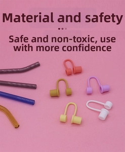 Flat lay detail showing colorful 10mm silicone straw covers on matching glass straws