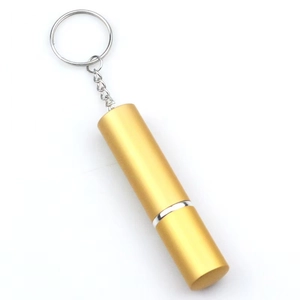 Portable 5ml gold refillable perfume spray bottle with metal keychain and sleek finish