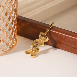 Pince à cheveux papillon dorée en acier inoxydable 18K avec décor élégant