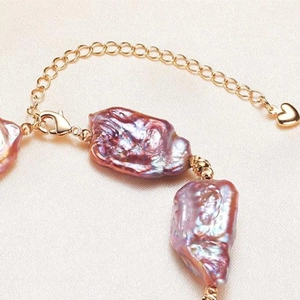 Baroque freshwater pearl bracelet with gold-plated chain and heart pendant