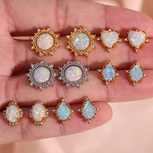 Assorted gold plated stainless steel stud earrings featuring colorful opal and zircons