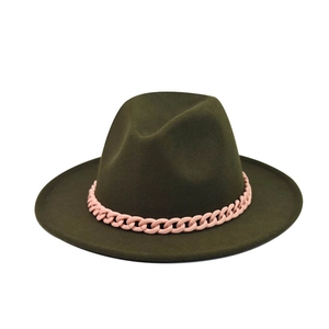Detail of dark olive wool fedora hat featuring a stylish pink chain band decoration