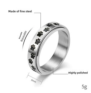 Detalle del anillo giratorio de 6 mm de acero inoxidable con huellas de perro