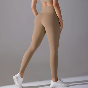 Close-up of high-waisted yoga leggings with butt-lifting cut in earth tone tech fabric