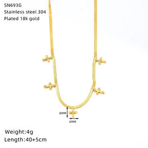 Close-up of 18K gold plated snake chain with five cubic zirconia cross pendants