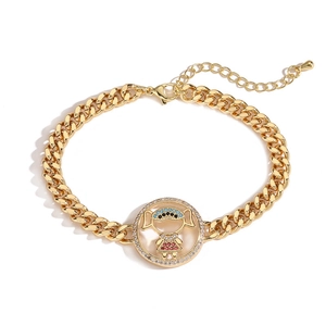 Golden Cuban chain bracelet featuring a hollow round pendant with a colorful girl design
