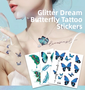 Glitter butterfly temporary tattoos with blue feathers and artistic script for festivals