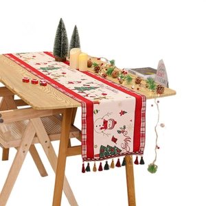 Christmas chenille table runner with snowman patterns and red green tassels for holiday decor
