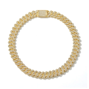 Close-up of gold-plated Cuban link chain with sparkling rhinestones and square clasp
