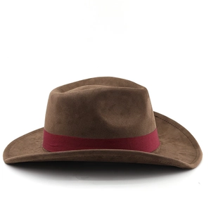Close-up of brown felt cowboy hat with burgundy ethnic ribbon and sturdy stitching