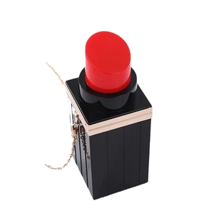 Lipstick shaped acrylic clutch evening bag with black body and red top gold chain