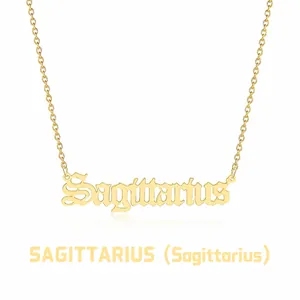 Detailed view of Sagittarius zodiac necklace in gold finish on a white background
