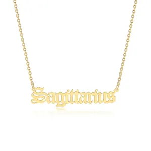 Detailed view of Sagittarius zodiac necklace in gold finish on a white background