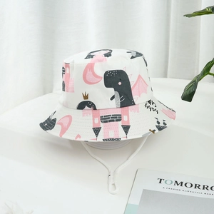 Toddler sun hat with dinosaur and castle prints featuring white adjustable chin strap