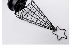 Close-up of black metal wire Christmas tree lamp with LED string lights inside