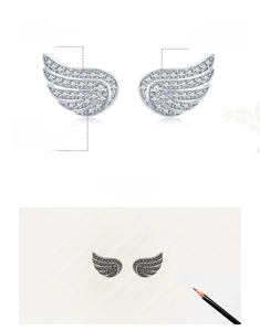Macro shot of S925 sterling silver wing earrings with 5A grade micro-pave zircons