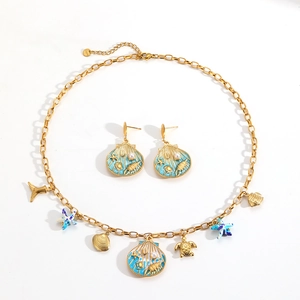 Golden ocean jewelry set with shell starfish sea turtle pendants and blue enamel pearls