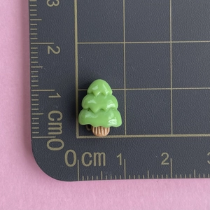 Detailed measurement of mini green resin Christmas tree charm showing 1.3cm height