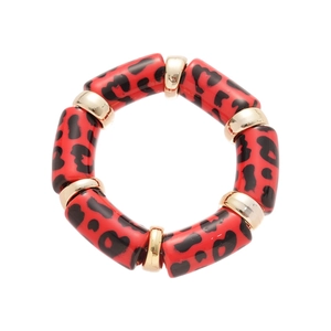 Acrylic leopard print stretch bracelet with red resin beads and gold-tone metal spacers