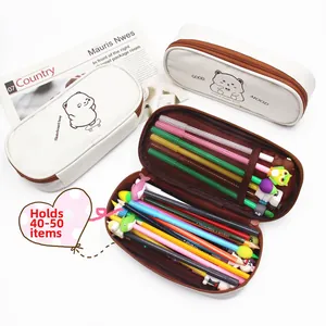 Detail of bear pencil case interior showing multi-layer storage for 50 pens