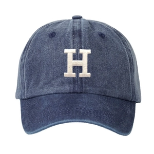 Classic washed navy baseball cap featuring white embroidered H logo in a front view