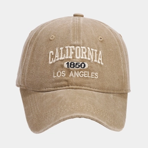 Detailed embroidery of CALIFORNIA 1850 text on washed khaki vintage baseball cap