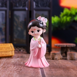 Close-up of a resin Chibi figure in a pink Hanfu with floral hair accessories