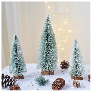 Three-piece frosted mini Christmas tree set with rustic wood bases and artificial snow