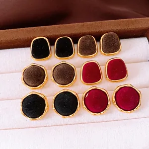 Vintage velvet geometric earrings in black, brown, and red with gold metal frames