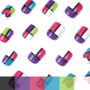 Short square press-on nails featuring colorful geometric heart patchwork patterns