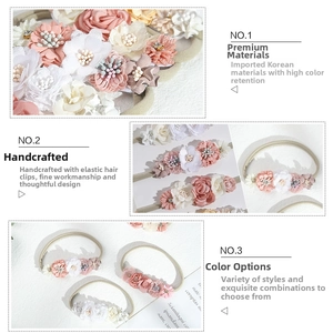 Detail of five handmade fabric flowers on soft elastic nylon headband for baby girls