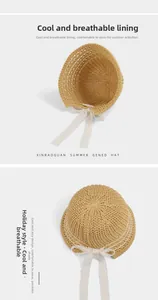 Close-up showing breathable openwork knit structure and white lace ribbon of sun hat