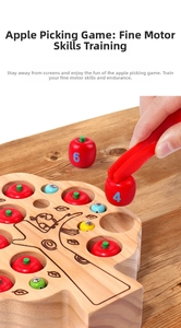 Close-up of a child's hand using red tongs to pick a numbered wooden apple toy from a base