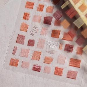 Macro view of MS 705 thin nail stickers featuring retro red lace and fabric textures