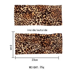 Cross-twisted leopard print velvet headband with dimensions showing 9cm width and 23cm length
