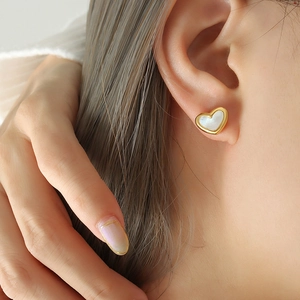Elegant heart-shaped gold stud earrings with white mother-of-pearl inlay for women