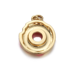 Detail of gold donut charm with bite mark and red enamel filling for fashion bracelet