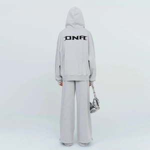 Detail of artistic DNA black print on the back of light gray cotton oversized hoodie