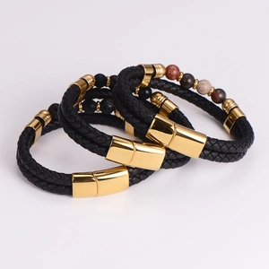 Three-piece men's braided leather bracelet set with stone beads and gold magnetic clasp