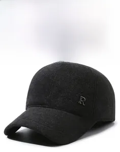 Detail of dark grey wool baseball cap showing thick fabric texture and metal R logo